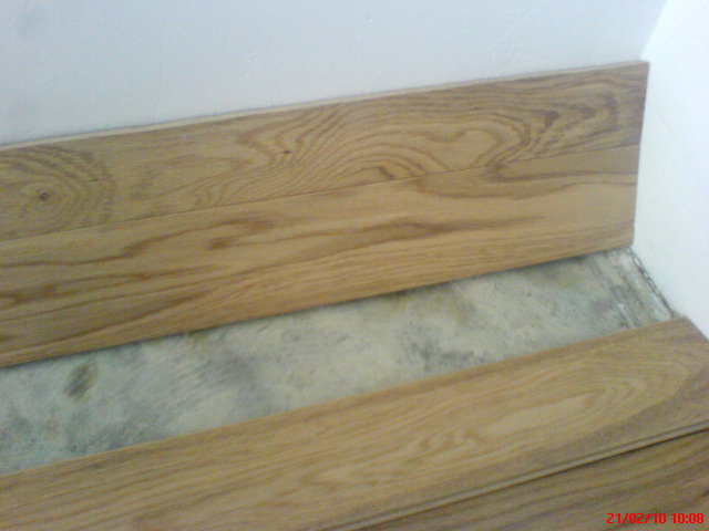 PARQUET FLOTTANT MASSIF PLINTHES POSE DES LAMES PREVOIR JOINT DE DILATATION CALES